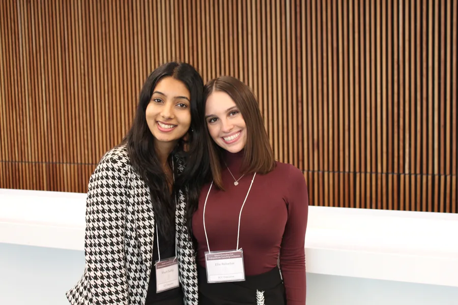 Khushi with a fellow SCC executive at the Undergraduate Consulting Conference